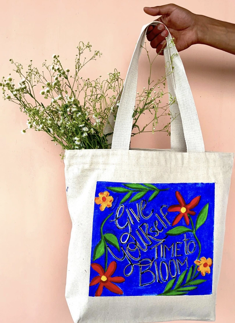 Hand-Painted Woman with Green Saree and Colorful Accents Tote Bag