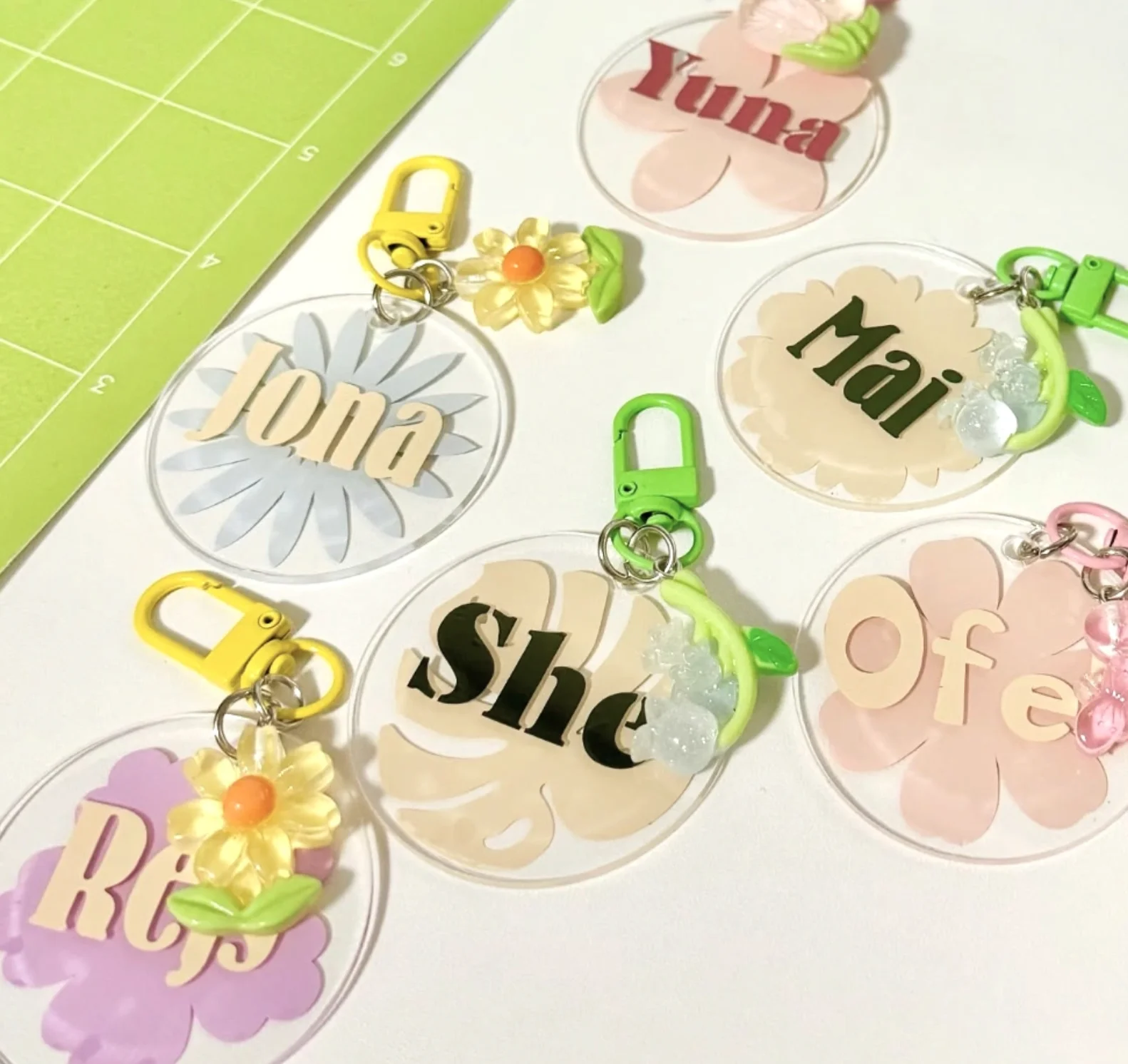 Personalized Acrylic Keychains with Floral Embellishments