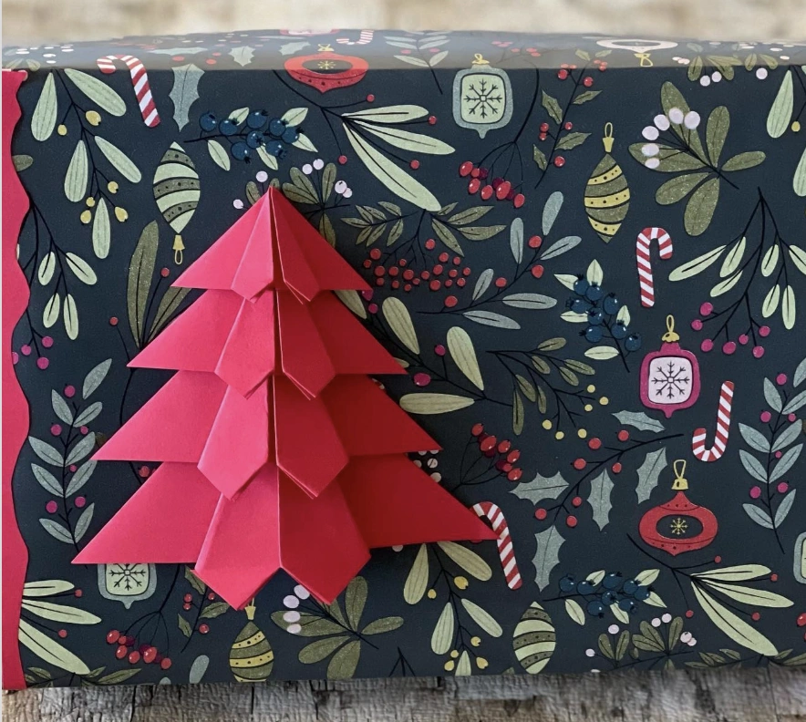 Striped Gift Wrap with a Lavish Purple Bow and Berry Embellishment