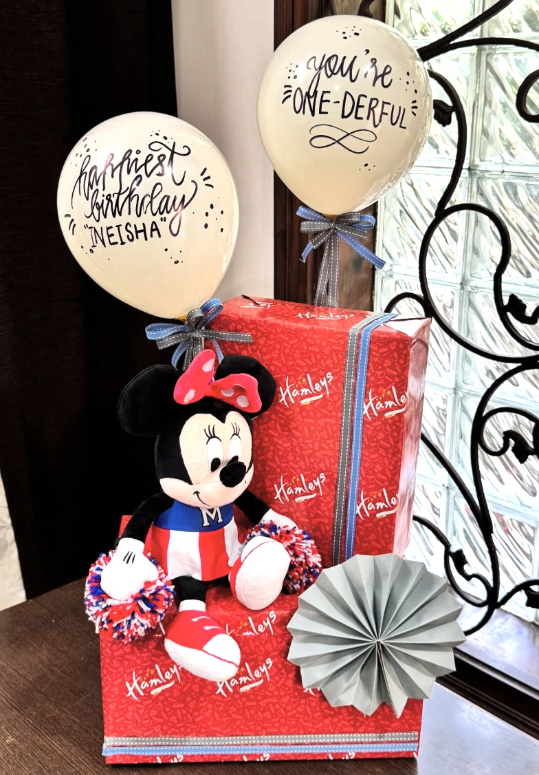 Brown Paper Packages Tied Up With Black Ribbon & Cinnamon Sticks.