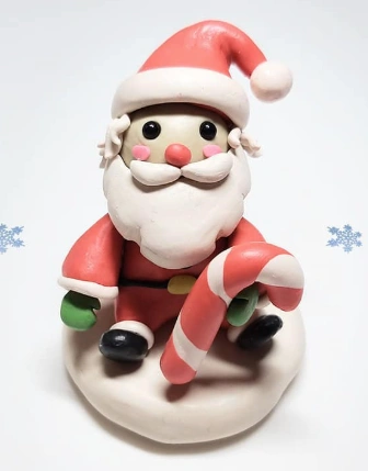 Adorable Handmade Clay Santa with Candy Cane