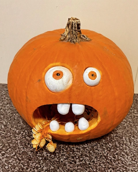 Pumpkin-Eating-Pumpkin Carving: A Toothy Grin