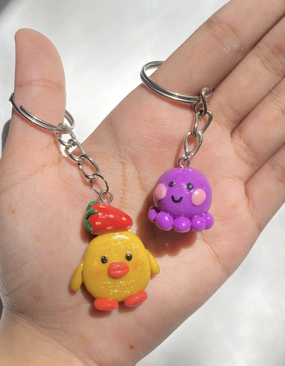 Quirky Clay Charms: Strawberry-Topped Chick & Smiley Purple Octopus
