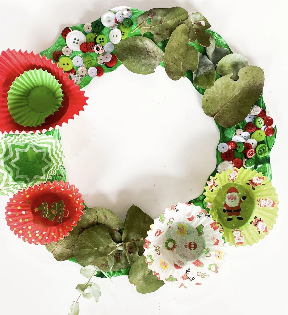 Festive Holiday Garland: Handmade Christmas Figures and Gift Cutouts