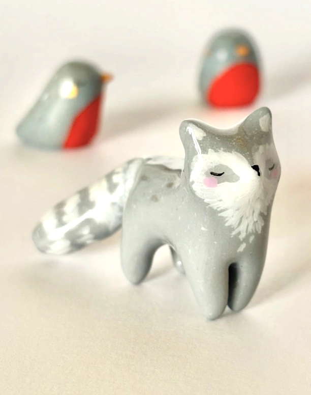 Handmade Grey Clay Fox Figurine with Robin Accents