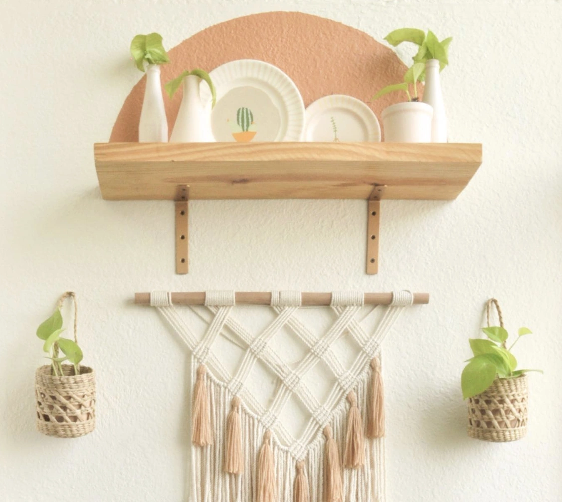 Bohemian Chic: Brown Adobe Wall With Teal Accents and Planter Pockets