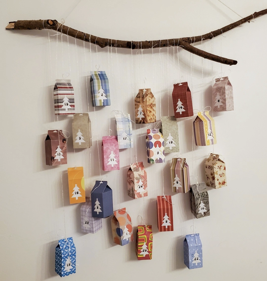 DIY Advent Calendar: Hanging Branch with Patterned Treat Boxes