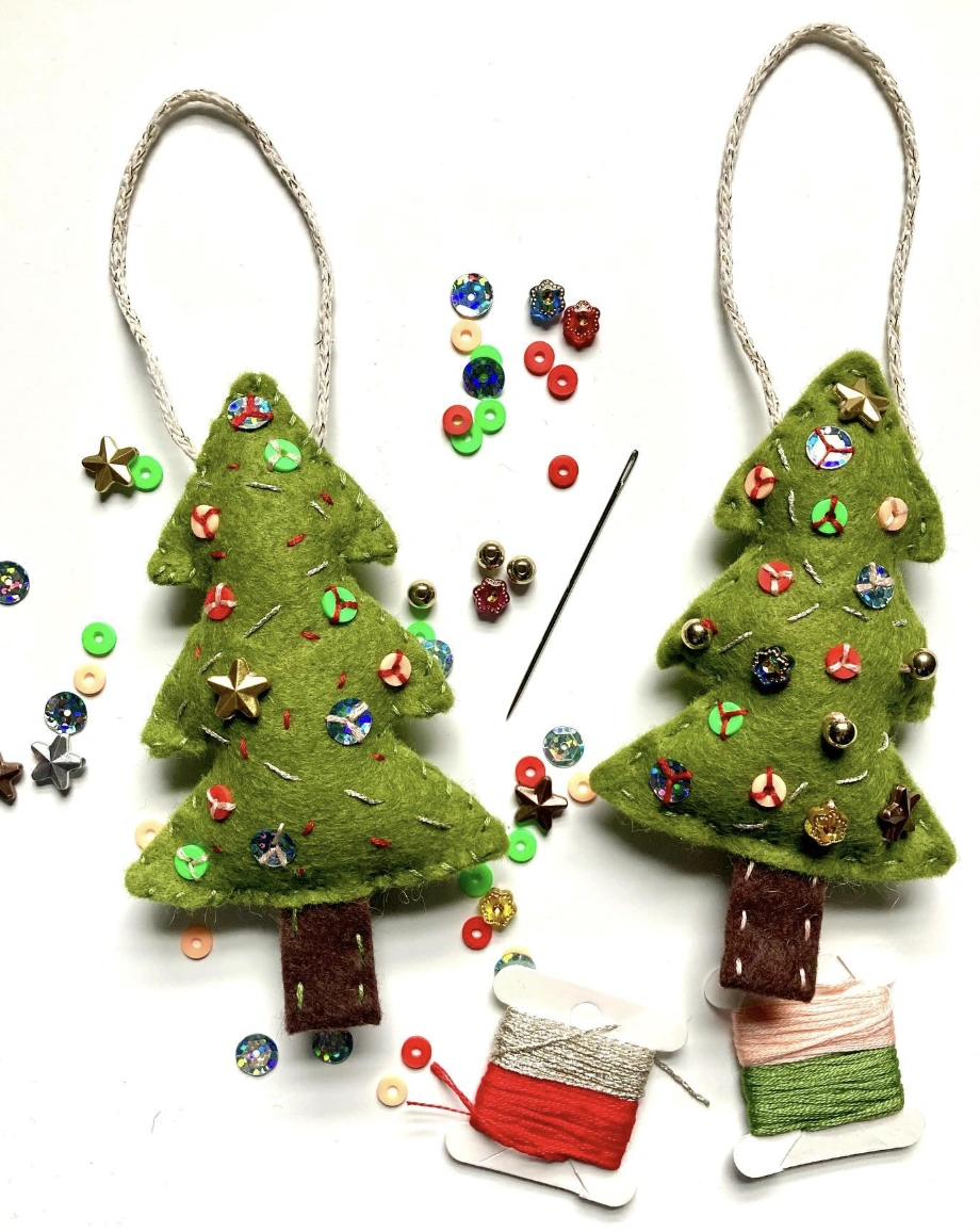 Yarn Tassel Christmas Tree Wall Hanging on Faux Wood