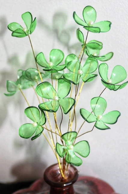 Translucent Plastic Bottle Flowers on Wooden Dowels