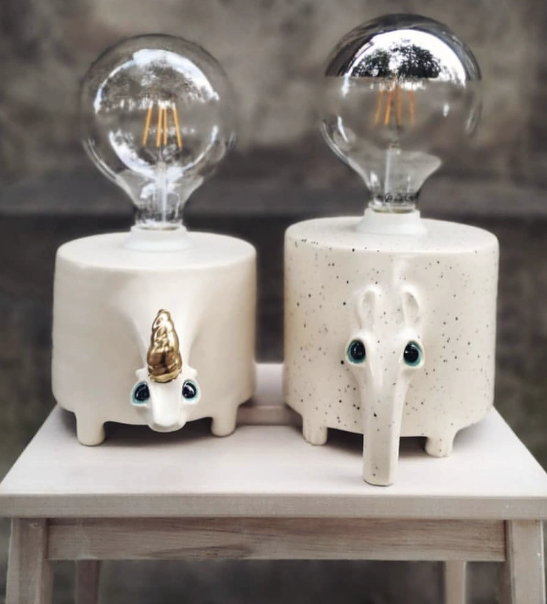 Earth-Toned Vases and Wide-Eyed Ceramic Owl