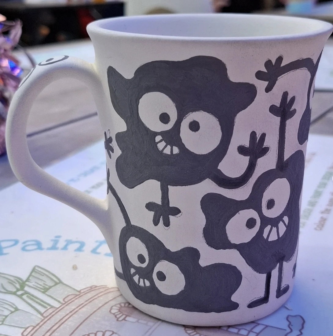 Hand-Painted Mug with Playful Monster Silhouettes
