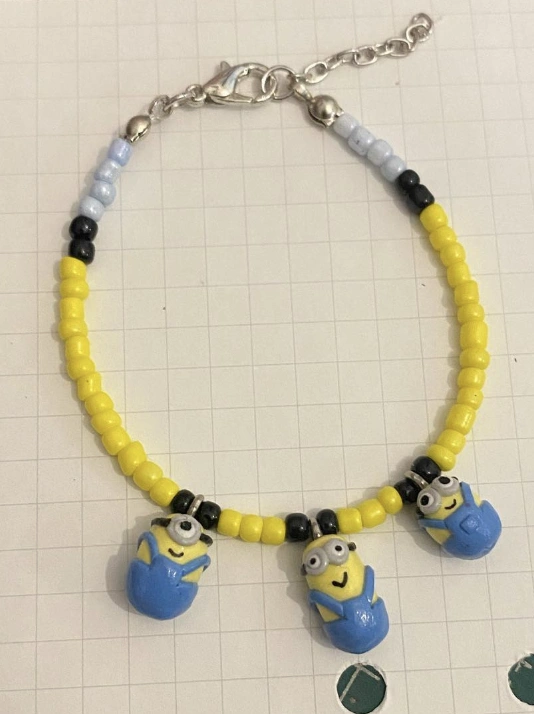 Knot Tied Bracelet with Ceramic-Style Clay Beads and Seashell Pendant